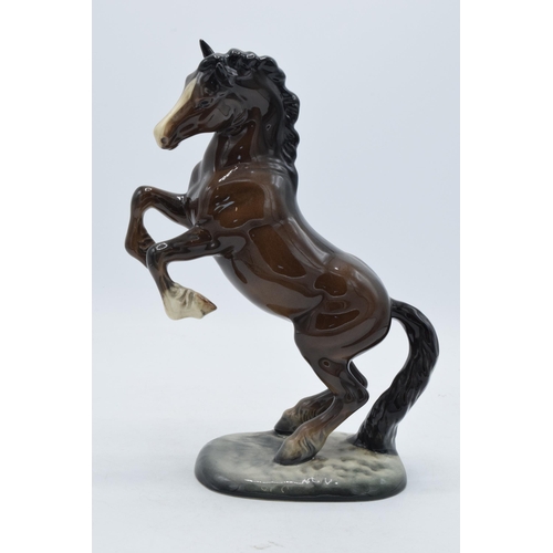 151 - Beswick rearing brown horse 1014 with tail attached.