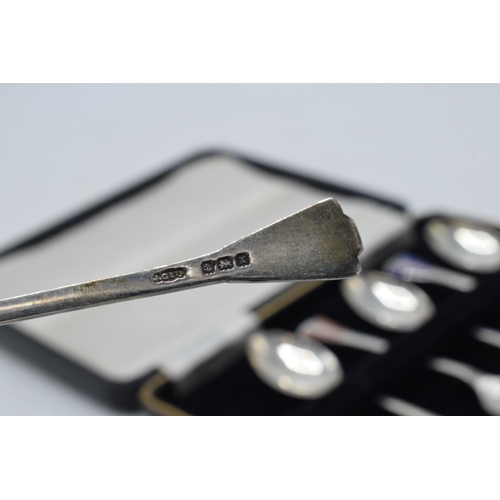 204 - A cased set of 6 silver teaspoons with coloured enamel decoration, 38.3 grams / 1.23 oz. Birmingham ... 