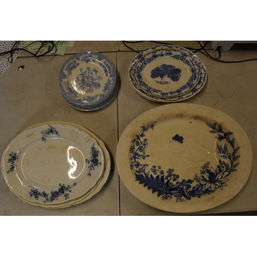 26 - A collection of 19th century and later blue and white pottery to include meat plates, platters and d... 