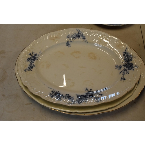26 - A collection of 19th century and later blue and white pottery to include meat plates, platters and d... 