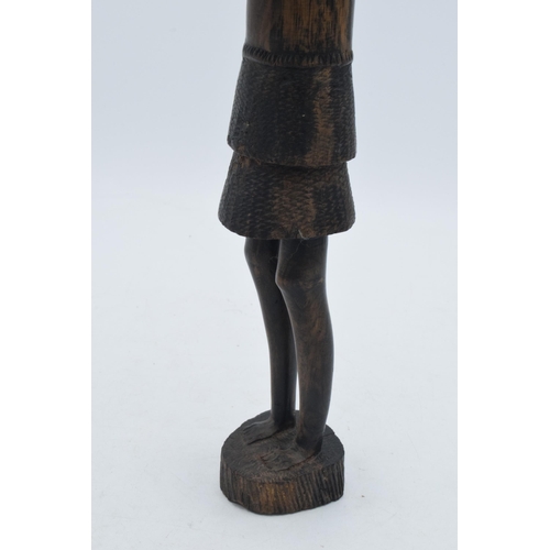 280 - 20th century African tribal carving of a figure, 35cm tall.