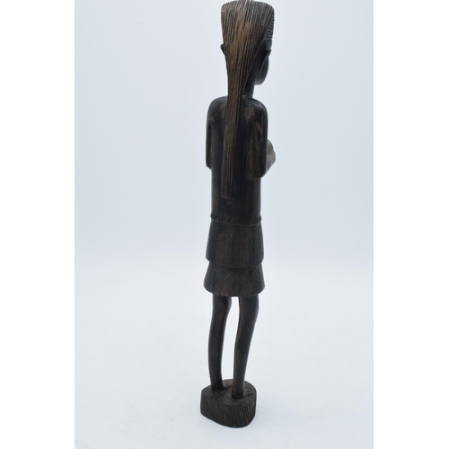 280 - 20th century African tribal carving of a figure, 35cm tall.