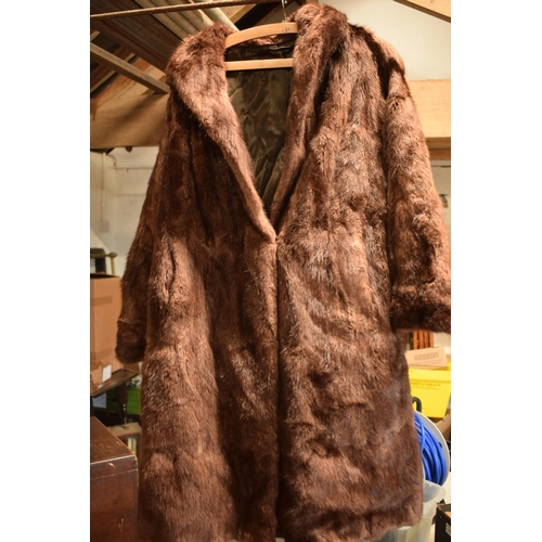 285 - A trio of vintage fur coats of varying colours and sizes (3).