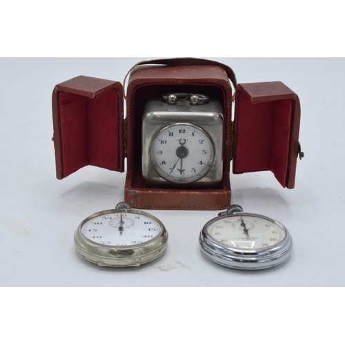 293 - Cased Kienzle Tatiana travelling clock together with Sekonda stop watch and one similar (3) (all in ... 