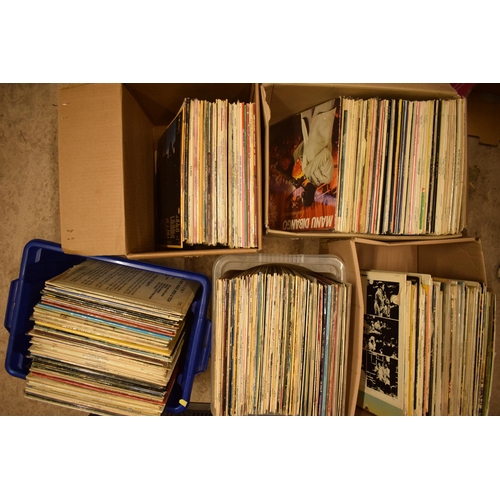 307 - An extensive collection of LPs and records of varying ages and genres to include rock, disco, funk, ... 