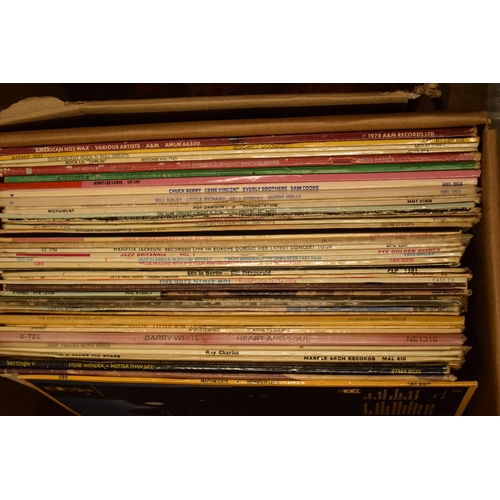 307 - An extensive collection of LPs and records of varying ages and genres to include rock, disco, funk, ... 