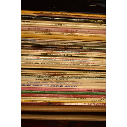 307 - An extensive collection of LPs and records of varying ages and genres to include rock, disco, funk, ... 