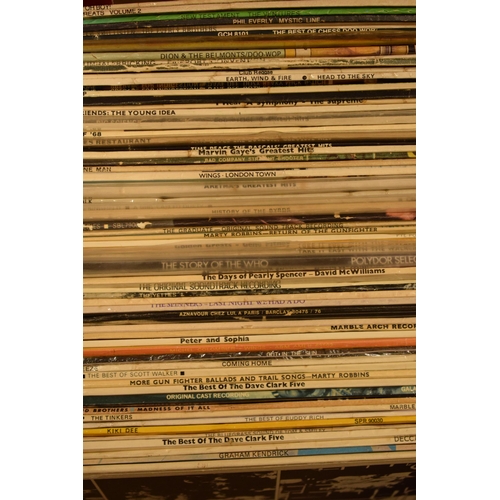 307 - An extensive collection of LPs and records of varying ages and genres to include rock, disco, funk, ... 