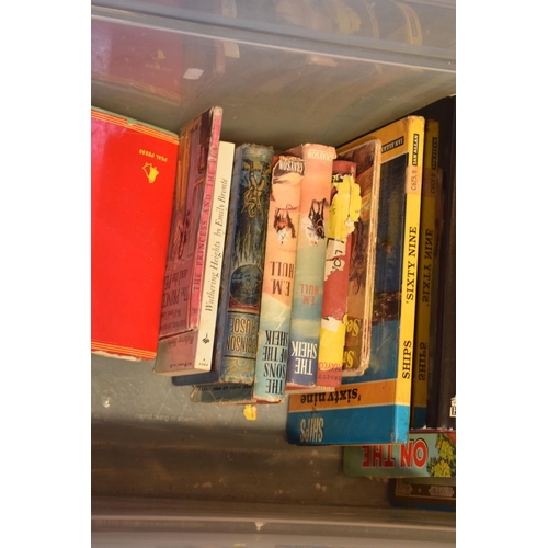 309 - A large collection of mixed books to include antiques reference books, novels and other miscellaneou... 