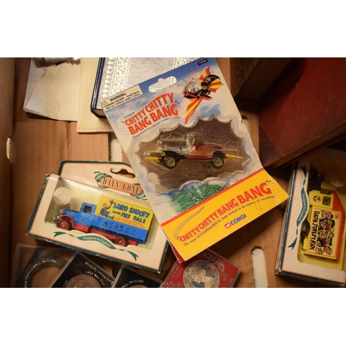 315 - A mixed collection of items to include boxed Corgi Chitty Chitty Bang Bang TY87801, commemorative co... 