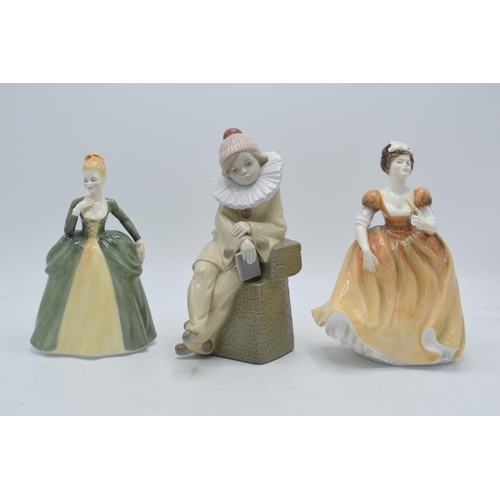 42 - Lladro figure of a jester together with a pair of Francesca figures (3).