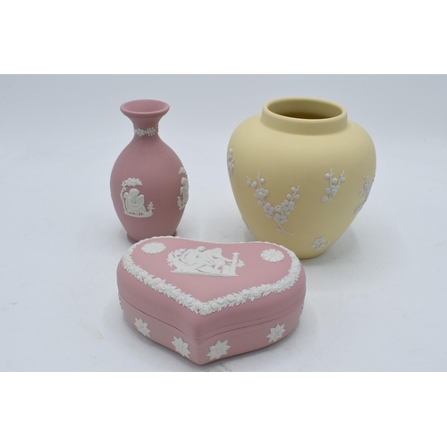 80 - A trio of Wedgwood Jasperware to include yellow prunus vase together with pink Jasperware heart-shap... 