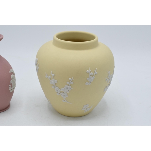 80 - A trio of Wedgwood Jasperware to include yellow prunus vase together with pink Jasperware heart-shap... 