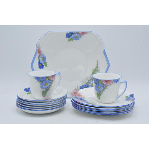 89 - Shelley Strand shaped tea set pattern 12216 to include a cake plate, 6 saucers, 5 side plates, 2 cup... 