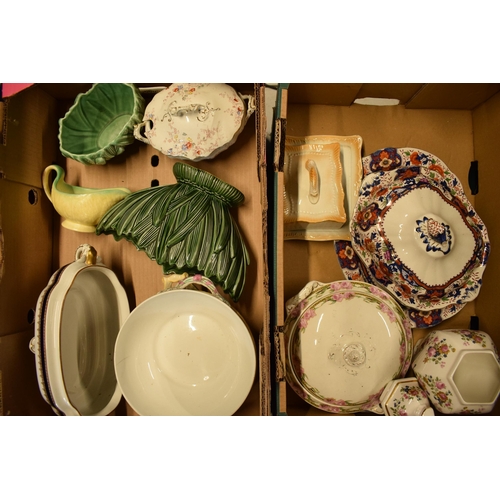 11 - A mixed collection of 19th century and later pottery to include a ginger jar, tureens, butter dish a... 