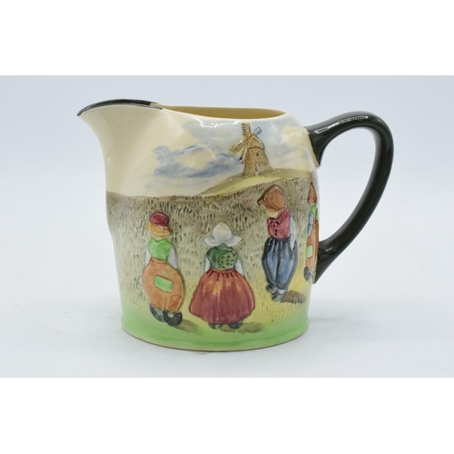 165 - Royal Doulton embossed series ware jug Dutch Children near a windmill, 13cm tall.