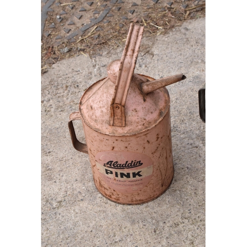 254 - A pair of Aladdin vintage fuel cans together with Aladdin Pink Paraffin heater (53cm tall) together ... 