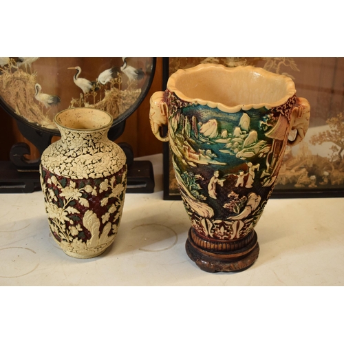 319 - A pair of oriental carved cork dioramas in ebonised frames together with resin soapstone-effect vase... 