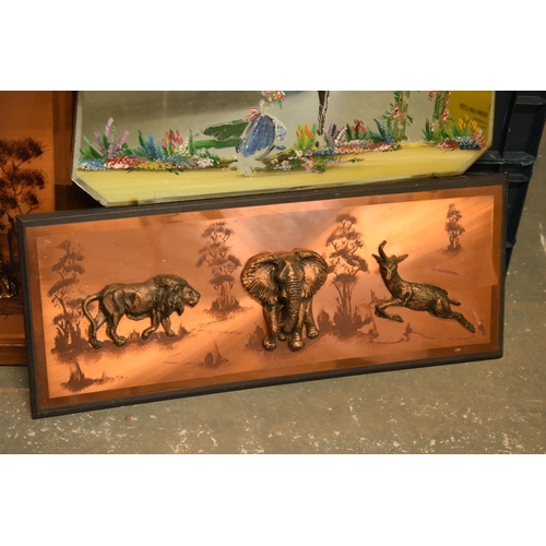 322 - A pair of engraved copper plates of African elephant scenes, one with clock, together with a painted... 