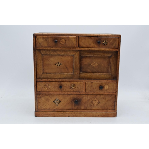 323 - Early 20th century apprentice chest of drawers with satinwood inlay with drawers and sliding doors, ... 