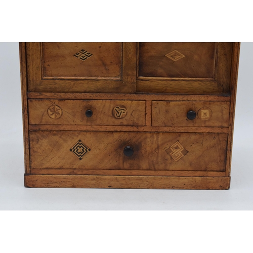 323 - Early 20th century apprentice chest of drawers with satinwood inlay with drawers and sliding doors, ... 