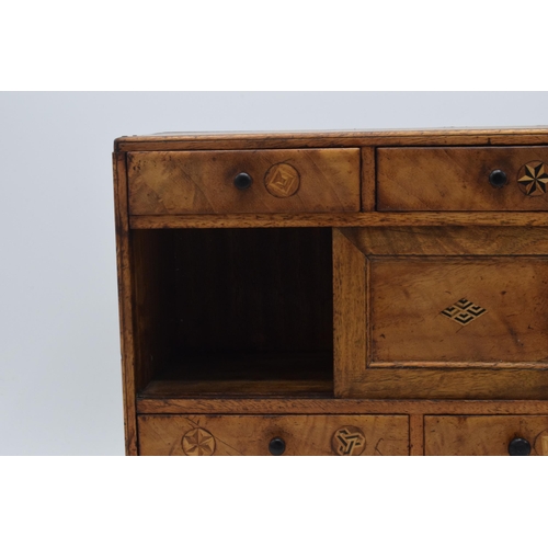 323 - Early 20th century apprentice chest of drawers with satinwood inlay with drawers and sliding doors, ... 