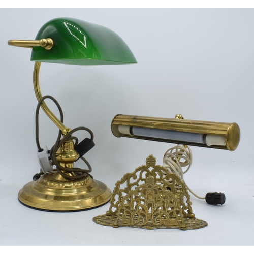 325 - A brass bankers lamp with green glass shade together with a similar brass example and a letter rack ... 