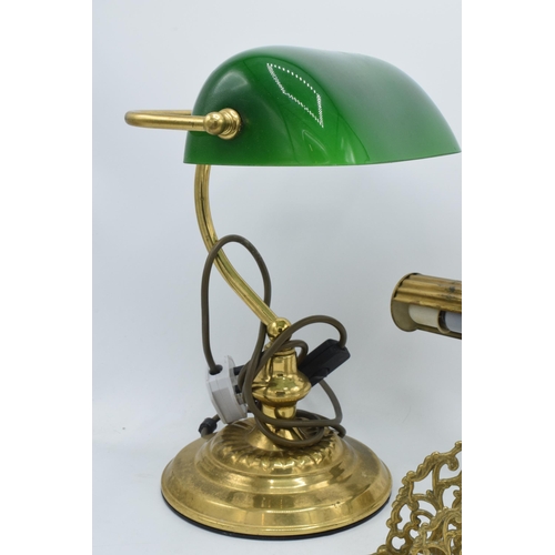 325 - A brass bankers lamp with green glass shade together with a similar brass example and a letter rack ... 