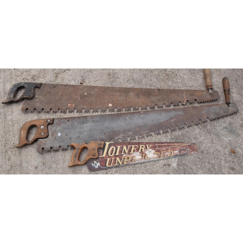 335 - A trio of vintage wooden and metal saws to include two two-man saws and small painted example (3), l... 