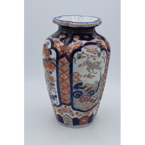 34 - Late 19th / early 20th century Japanese oriental shaped vase with traditional design, 25cm tall.