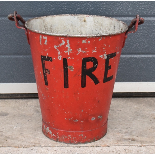 342 - Vintage metal fire bucket with swing-over handle painted red with 'FIRE' in black, 33cm tall with ha... 