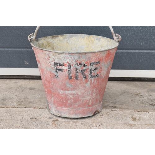 345 - Vintage metal fire bucket with swing-over handle painted red with 'FIRE' in black, 28cm tall with ha... 