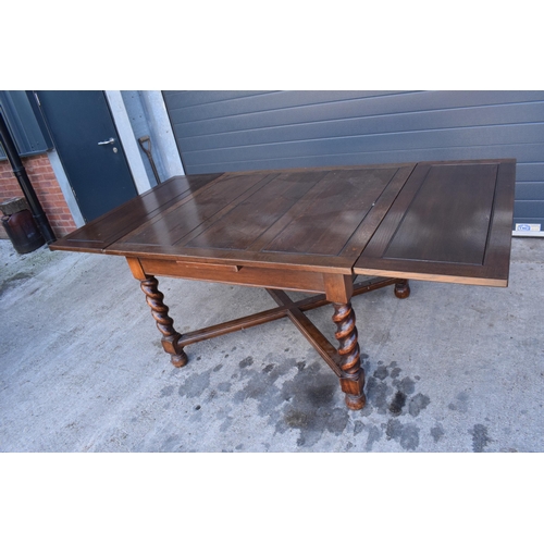 363 - Early to mid 20th hardwood extending dining table with pull-out leaves and diagonal supports. 121 x ... 