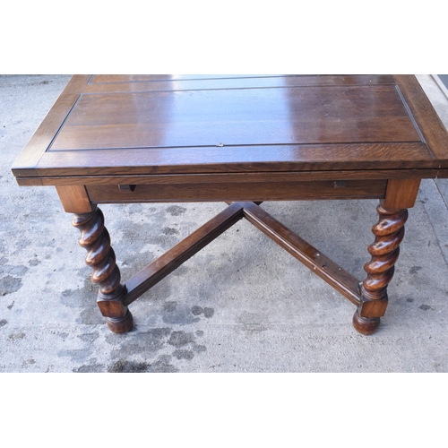 363 - Early to mid 20th hardwood extending dining table with pull-out leaves and diagonal supports. 121 x ... 