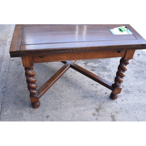 363 - Early to mid 20th hardwood extending dining table with pull-out leaves and diagonal supports. 121 x ... 