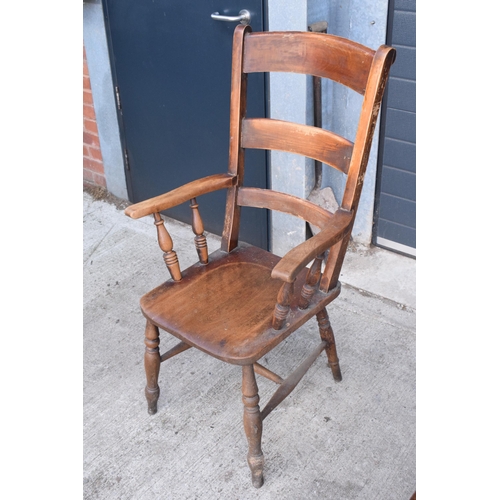 365 - Victorian wooden farmhouse armchair, 112cm tall.