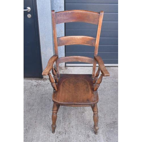 365 - Victorian wooden farmhouse armchair, 112cm tall.