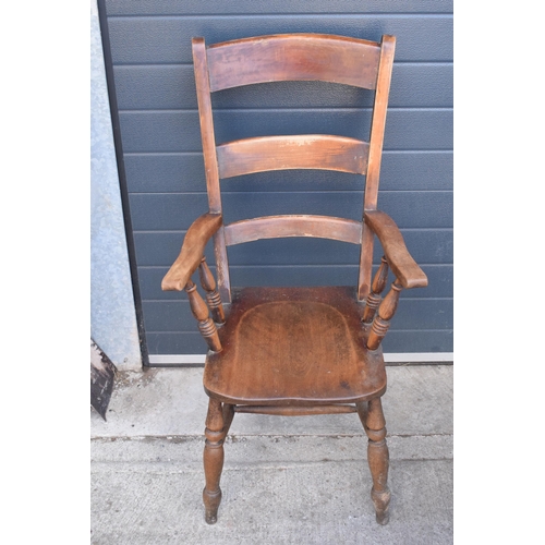 365 - Victorian wooden farmhouse armchair, 112cm tall.