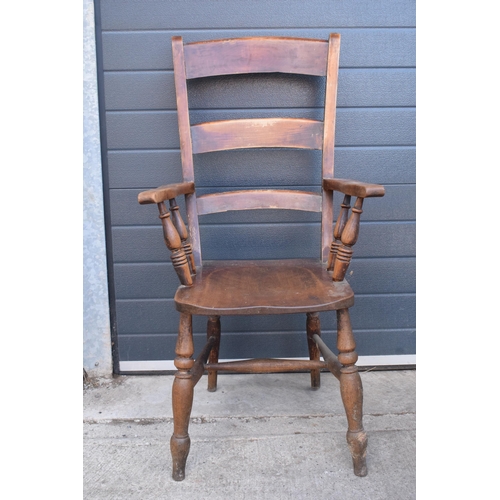 365 - Victorian wooden farmhouse armchair, 112cm tall.