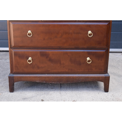 369 - Stag mid-century brown bureau with leather inset to interior. 76 x 46 x 98cm tall.