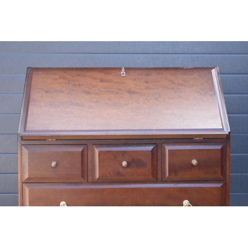 369 - Stag mid-century brown bureau with leather inset to interior. 76 x 46 x 98cm tall.