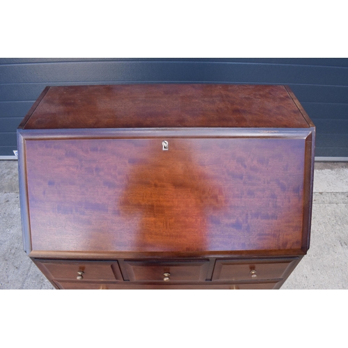 369 - Stag mid-century brown bureau with leather inset to interior. 76 x 46 x 98cm tall.