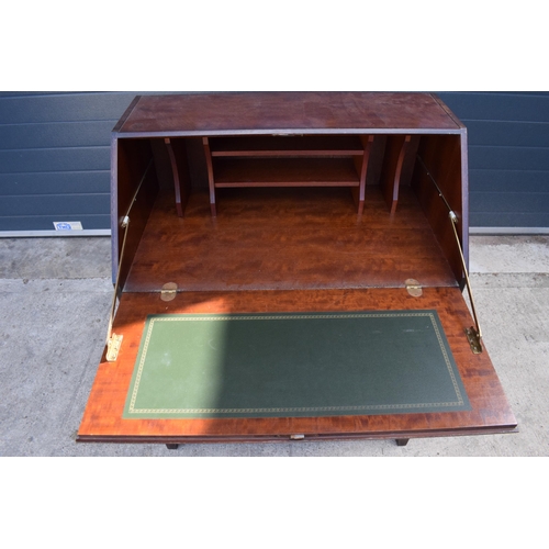 369 - Stag mid-century brown bureau with leather inset to interior. 76 x 46 x 98cm tall.