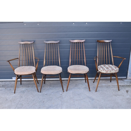 373 - A set of 4 mid century Ercol spindle-back chairs to include 2 arm chairs (4). 97cm tall.