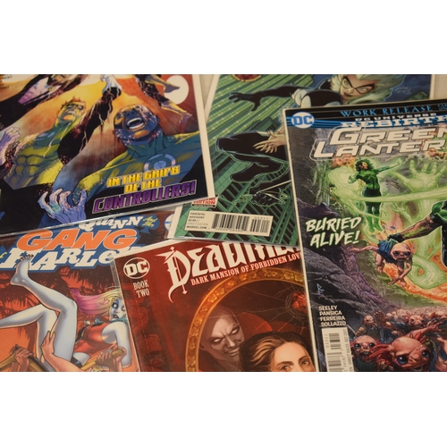 380 - A large collection of modern Marvel / DC / DC Universe comics mostly in plastic wallets to include H... 