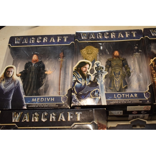 406 - A boxed collection of Warcraft figures of varying sizes to include Mediah, Blackhand, Duraton and bo... 