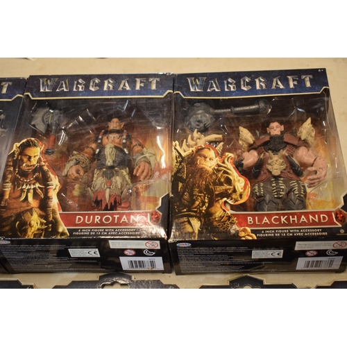 406 - A boxed collection of Warcraft figures of varying sizes to include Mediah, Blackhand, Duraton and bo... 