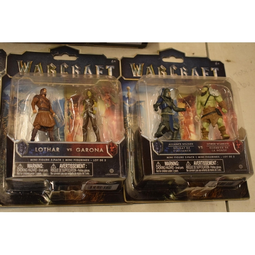 406 - A boxed collection of Warcraft figures of varying sizes to include Mediah, Blackhand, Duraton and bo... 