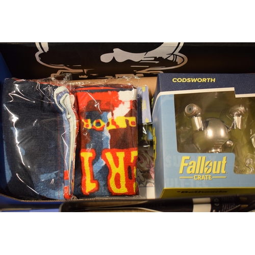 409 - A mixed collection of toys to include Fallout Crates to include merchandise, Fallout Mega Merge figu... 