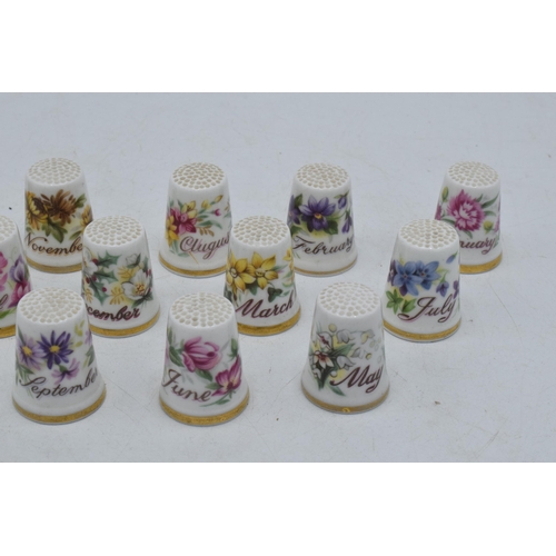 65 - A set of Royal Albert Flower of the Month thimbles, one for each month of the year, January - Decemb... 